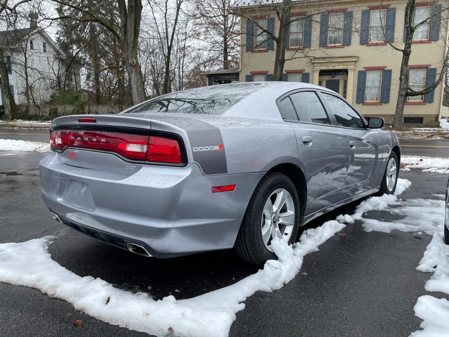 2014 silver Dodge Charger SXT (2C3CDXHG1EH) with an 3.6L V6 DOHC 24V engine, 8-Speed Automatic transmission, located at 101 N. Main Street, Muncy, PA, 17756, (570) 546-5462, 41.207691, -76.785942 - Photo#2